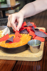 Mexican Chicken Chilli Appetizer in a Cast Iron Skillet and Chips