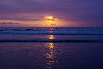 Sunset at Kuta Beach on the island of Bali in Indonesia.