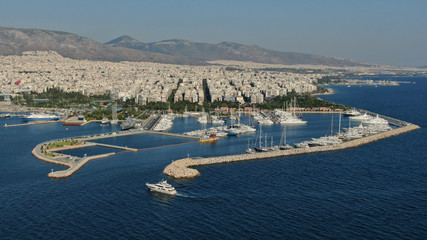 Aerial drone bird's eye top view photo of luxury yacht docked in Mediterranean destination port