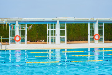 Facilities of an indoor pool in winter and outdoor in summer.