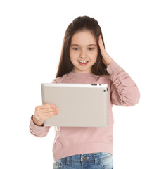Little girl using video chat on tablet against white background