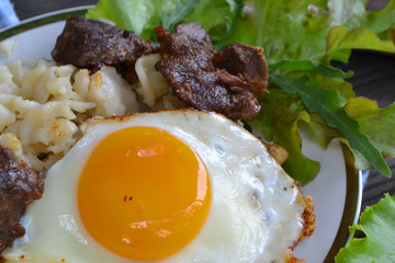 Pasta with boiled meat, cheese and eggs. Wildfowl cuisine