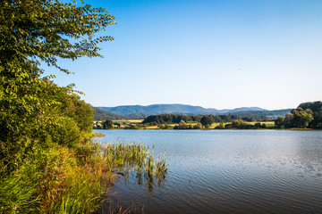 Naklejka na ściany i meble Gruza lake near the Kragujevac in Serbia, popular for fishing and camping, in summer.