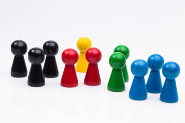 Group of colourful wooden figures