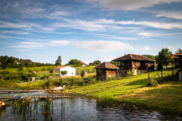 Naklejka na ściany i meble Gruza lake near the Kragujevac in Serbia, popular for fishing and camping, in summer.