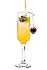 Mimosa cocktail decorated with cherry isolated on white background