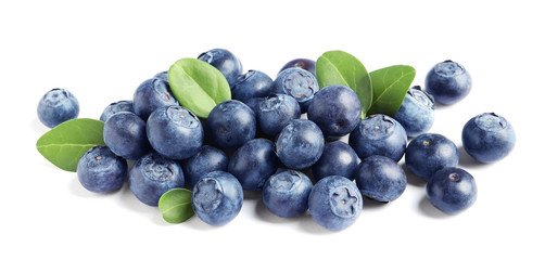 Fresh raw tasty blueberries with leaves isolated on white