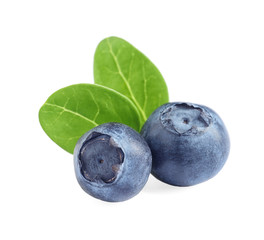 Fresh raw tasty blueberries with leaves isolated on white