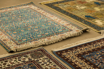 The carpets on the background in the shop for special costumers from Nevsehir, Sivas and other...