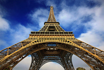 Fototapeta na wymiar PARIS, FRANCE. Upwards POV of the Eiffel tower.