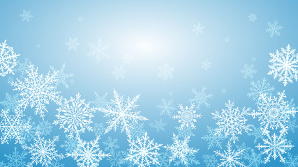 Christmas background with various complex big and small snowflakes in light blue colors
