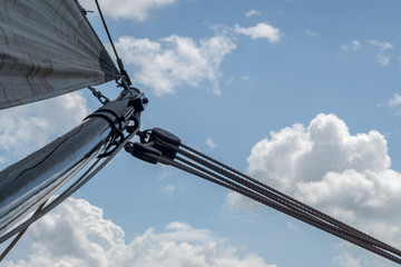 Main boom of a historical sailing ship rigged with ropes and pulley blocks © Peter Vernon Morris