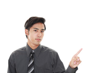 指示する笑顔のビジネスマン
