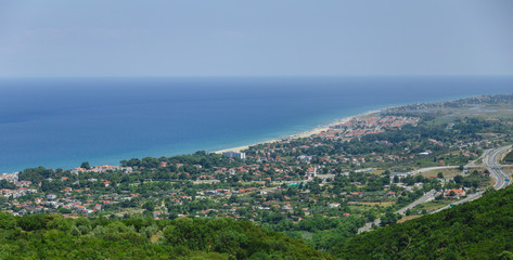 Panorama view to old village from the Olympus mountain. Coastline. Greece