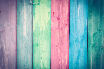 Pastel colors wooden wall background.