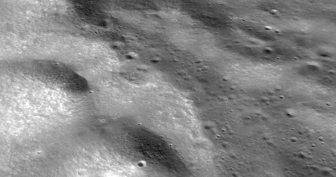 Medium-altitude circular tracking shot of foothills of the western Montes Jura range. LAT 44.51 LONG 323.7. Reversible, seamless loop. Elements of this image furnished by NASA