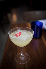 A sweet alcoholic beverage is served at an upscale restaurant