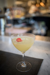 A sweet alcoholic beverage is served at an upscale restaurant