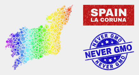 Obraz premium Constructor La Coruna Province map and blue Never GMO textured seal stamp. Rainbow colored gradiented vector La Coruna Province map mosaic of industrial items. Blue rounded Never GMO stamp.