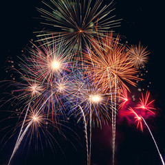 Happy new year 2020 with fireworks on dark background. Celabration festive new year firework headline or bannner.