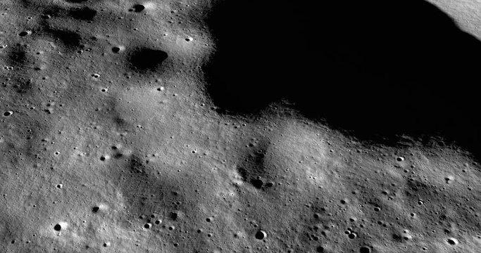 Medium-altitude circular tracking shot of rolling terrain NNE of Chaplygin Crater. LAT -1.73 LONG 149.15.  Reversible, seamless loop. Elements of this image furnished by NASA