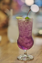 Butterfly pea flower drink with lime , honey and mint leaf