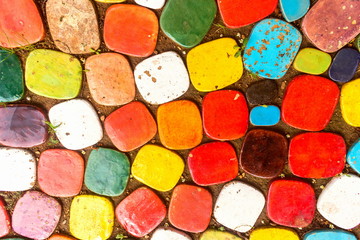 Multicolored decorated ceramic floor tiles pattern design as the abstract textured and background