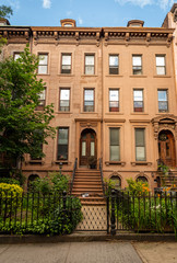 Historic brownsone building facade in Clinton Hill, Brooklyn, New York