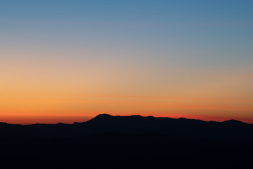 Mountain panorama during sunrise. Beautiful natural panoramic landscape in the summer time