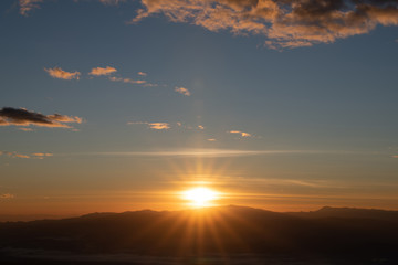 morning and sunrise on the winter season over the mountain layer at chingmai , thailand.