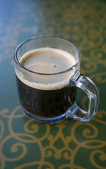 black coffee in a glass mug