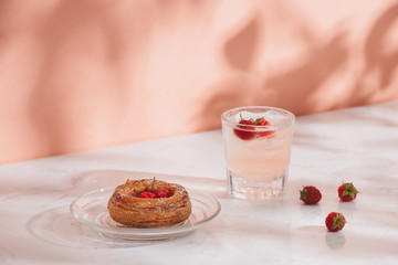 Freshly baked traditional pastry sweet mini danish raspberry and raspberries soda drinks
