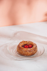 Homemade puff pastry with raspberries. Sweet tasty dessert. decorated with powdered sugar