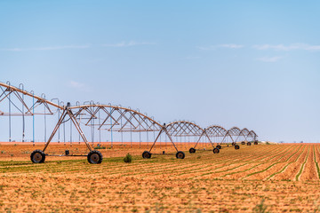 Brownfield, USA Texas rural countryside industrial field with water or fertilizer chemicals sprayer...
