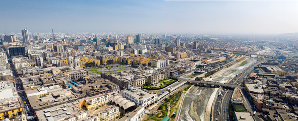 Aerial view of Lima main square, government palace of Peru and Rimac river. Panoramic cityscape with "Plaza de Armas" in the historic center of Lima.
