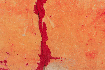 Texture of a concrete wall with cracks and scratches which can be used as a background