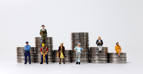 Coin stacks and various miniature people. 