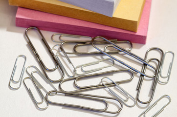 The paper clip is used to fasten paper sheets.