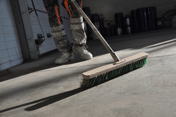 Cleaning of the production room using a brush.