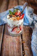 diet breakfast A glass of yogurt is filled with strawberries, blueberries and granola. different shooting options