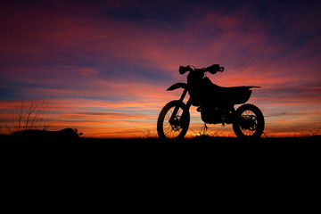 Obraz na płótnie Canvas Dirtbike sunset