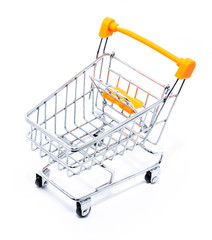 shopping cart isolated on white background, shopping cart miniature for advertising use, concept of commerce.