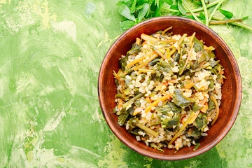Stewed bulgur with portulak