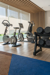 Sport bikes and gym equipment for exercise in fitness room
