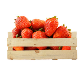 Strawberries in wooden box isolated on white background