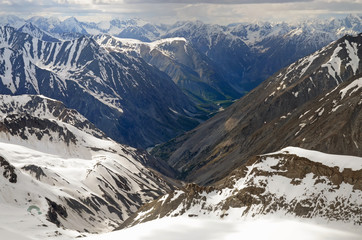 Alpine landscape. View at South Chuya Mountain Range from slope of IIktu Peak. Altai Republic, Siberia, Russia.