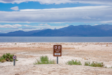 Closed area sign on the Salton Sea shore
