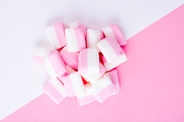 Colorful marshmallow on bright  background. Fluffy marshmallows texture and pattern