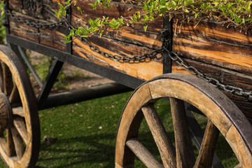 Fototapeta na wymiar rustic wooden wagon wheel exterior decoration object 