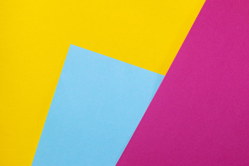 Bright background with yellow, blue and pink colors.